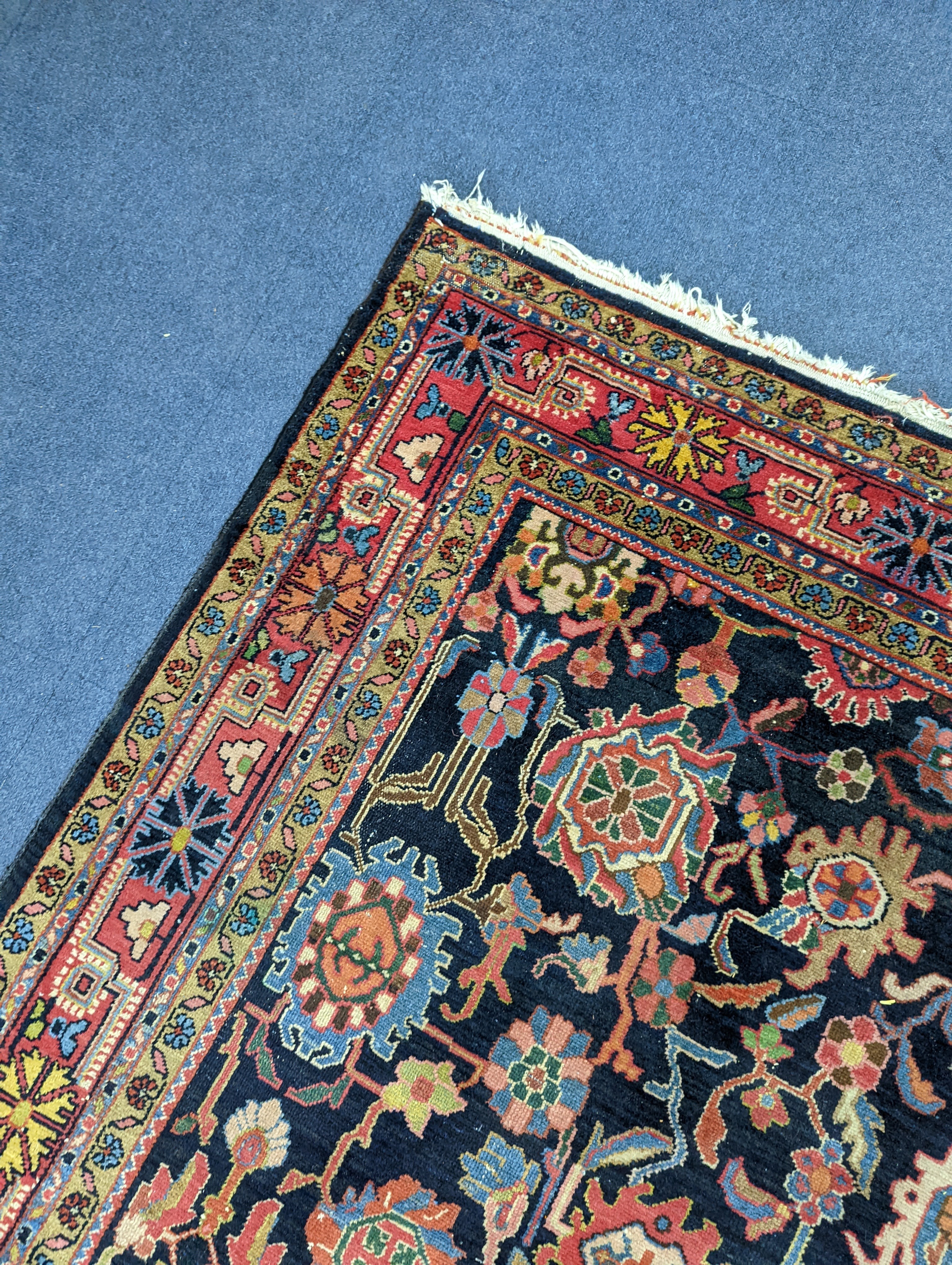 A Heriz / Moghal blue ground carpet, 340 x 206cm